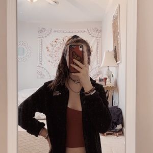 small black north face jacket